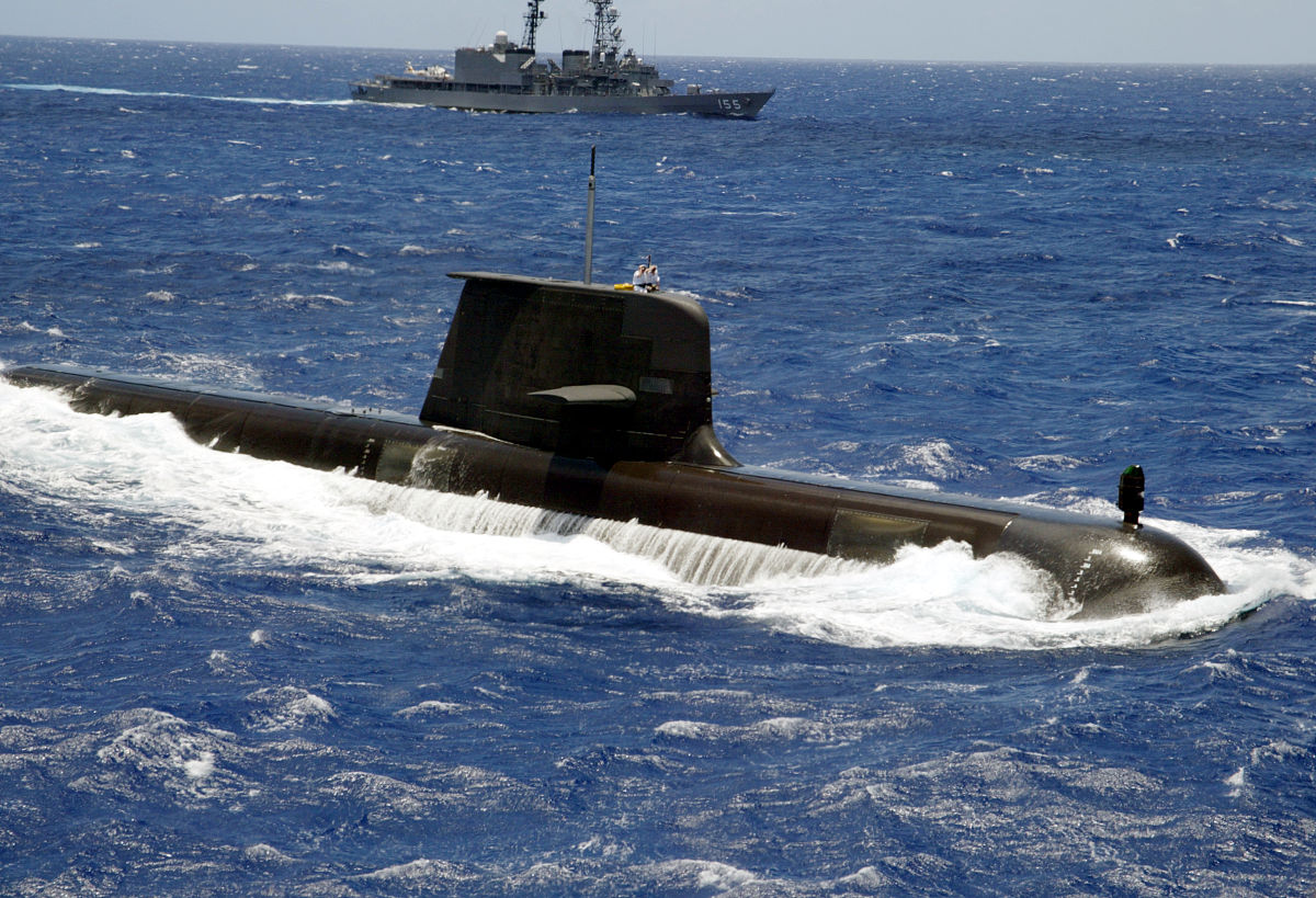 hawaii, submarine emerging during naval exercise. (photo by educ