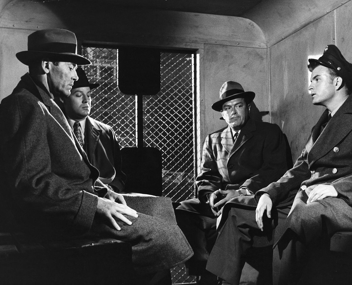 manny balestrero (henry fonda), far left, sits in the back of a 