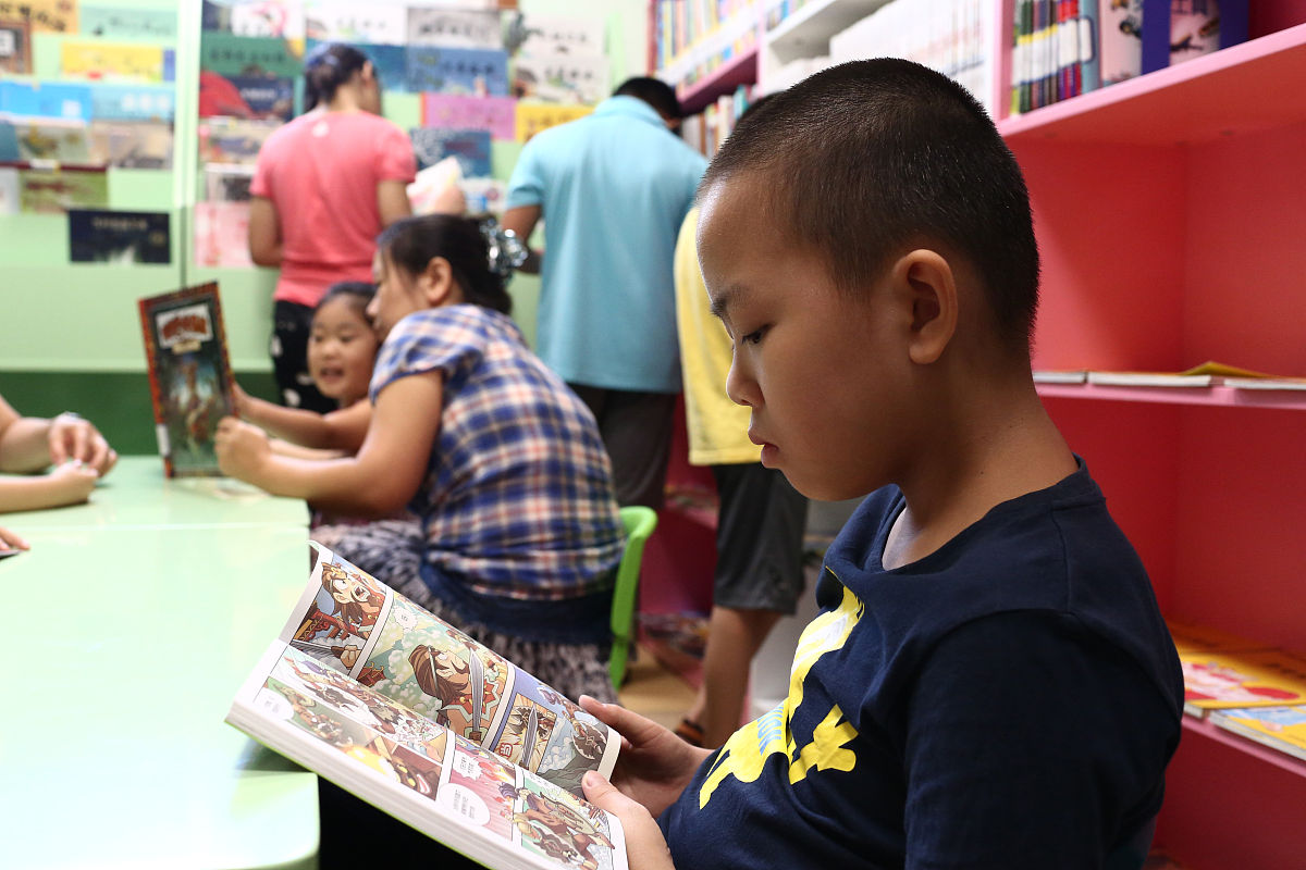 信息稿社区开展幼儿绘本阅读