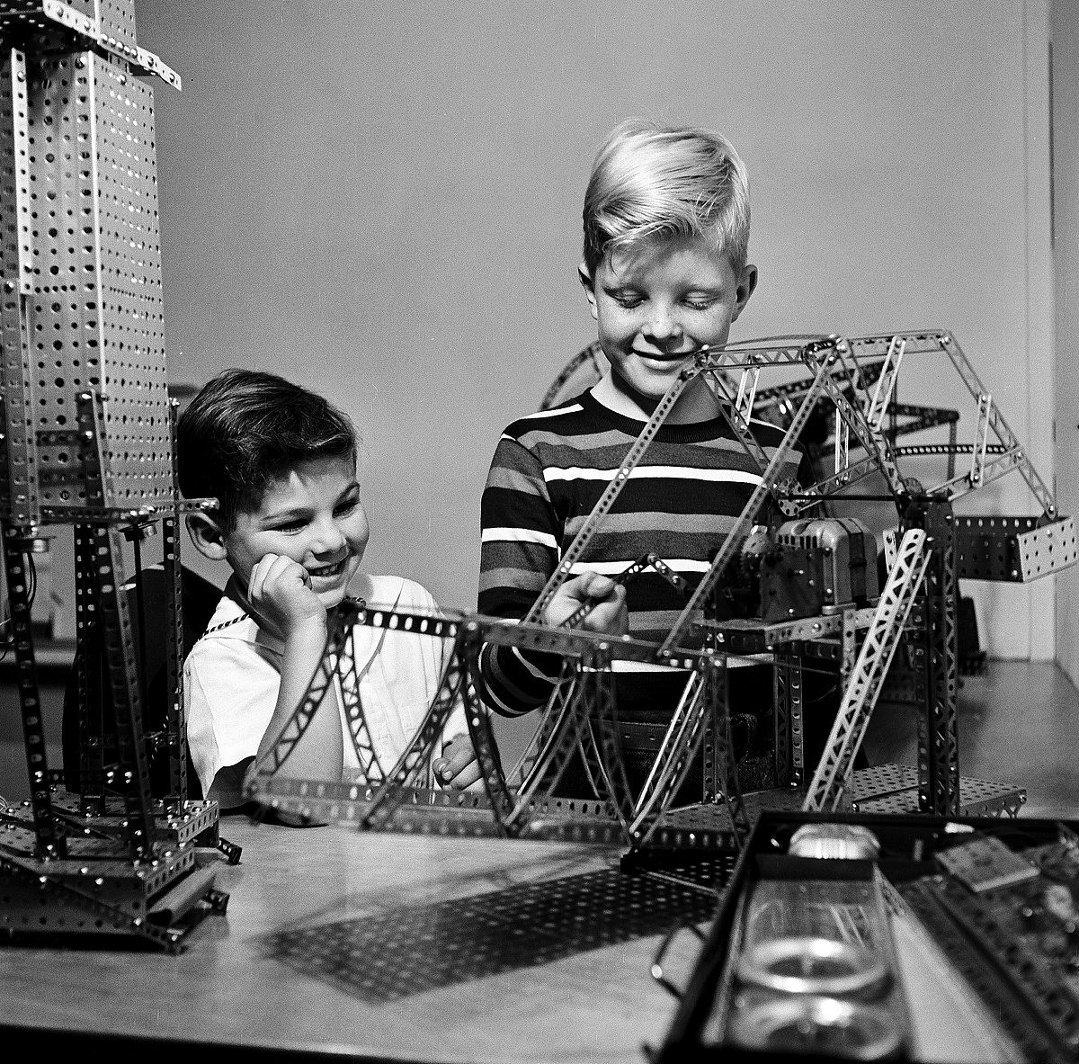 young boys playing with a metal erector set, 1948. (photo by rae