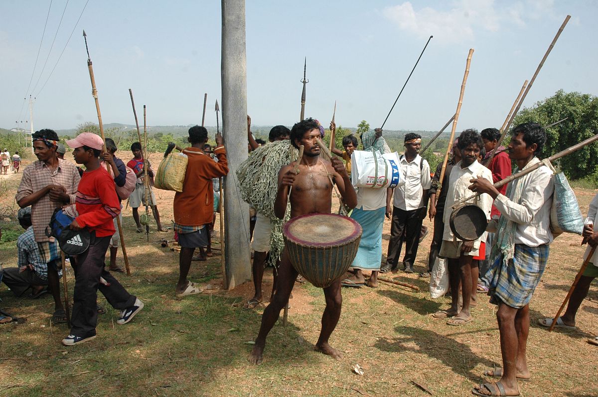 tribal men dancing during a hunting festival in the ayodhya hill