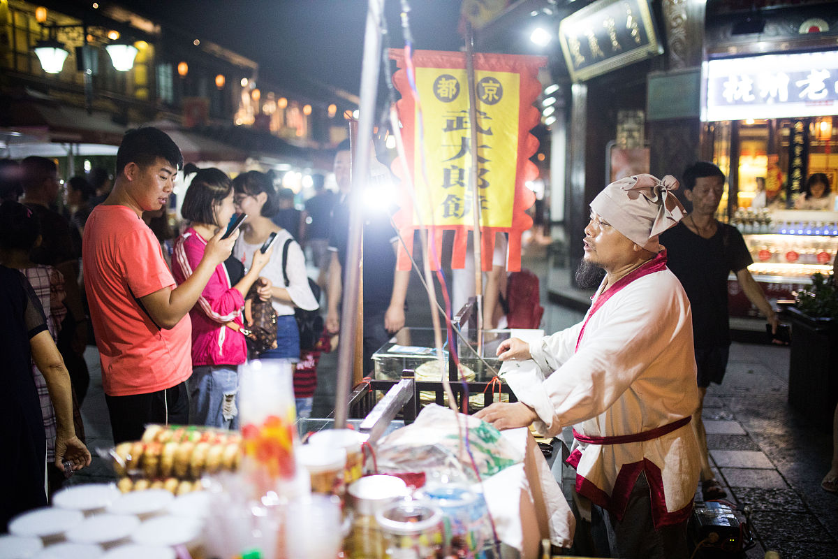 你刚才说武大郎是卖什么的？