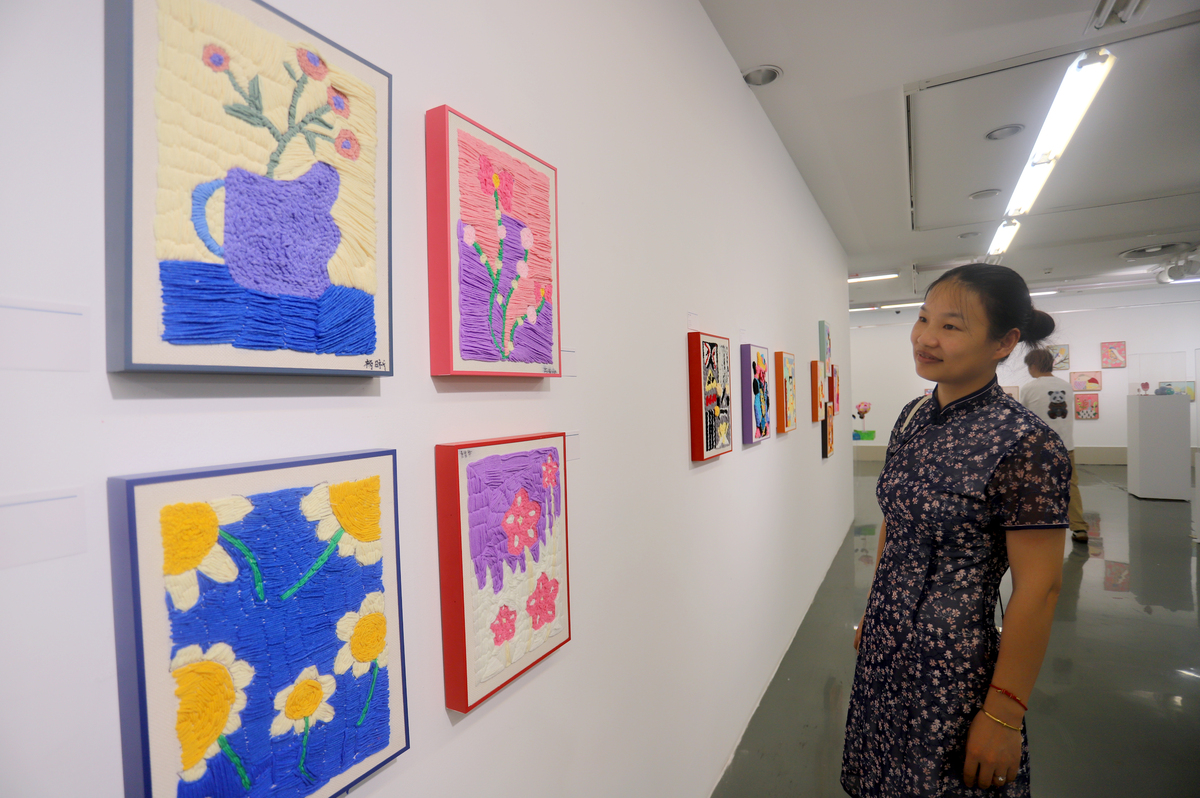 试论文化涵化与非遗传统美术的传承保护 写一篇较长的论文引言