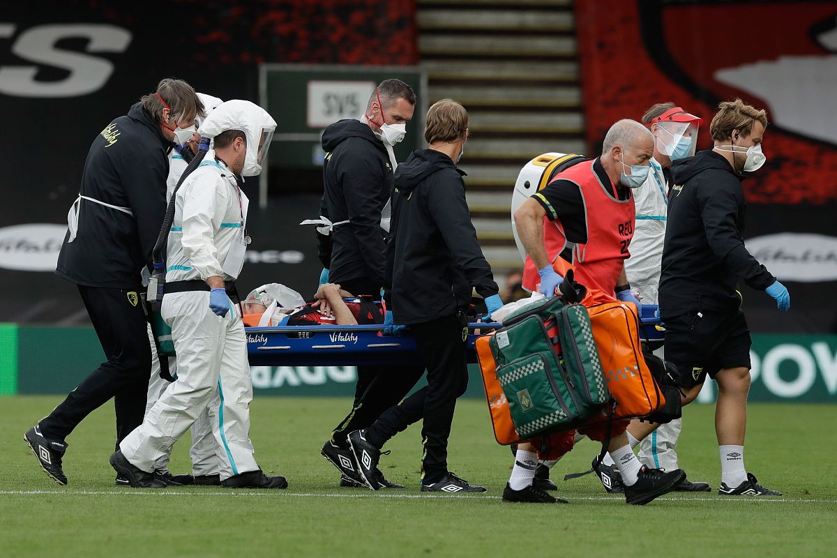bournemouth's english defender adam smith (<strong>c</strong>) is carried off the