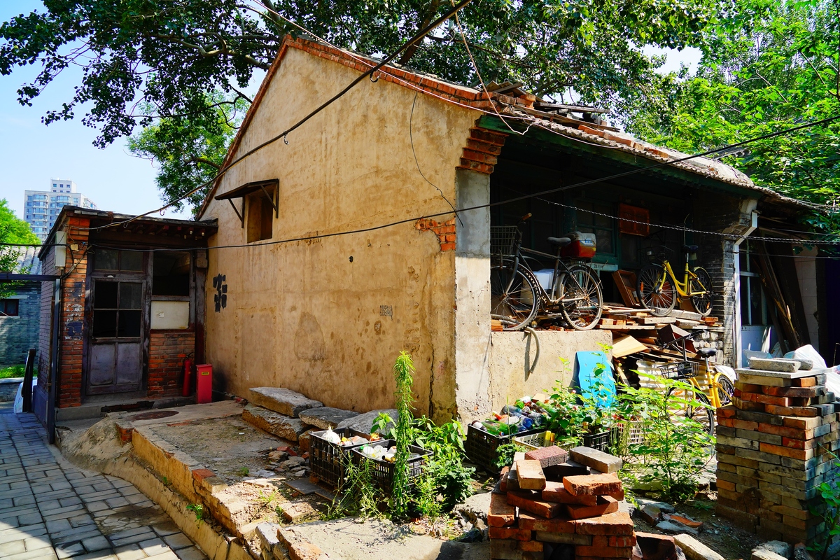 北京老城区平房院落违法建设问题发生的原因是什么请详细分析