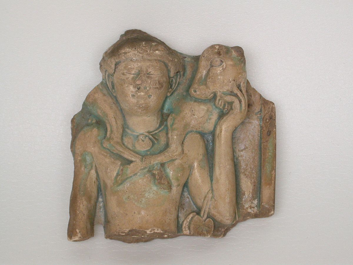 relief depicting a calf-bearer, egypt, ptolemaic period (304-30 