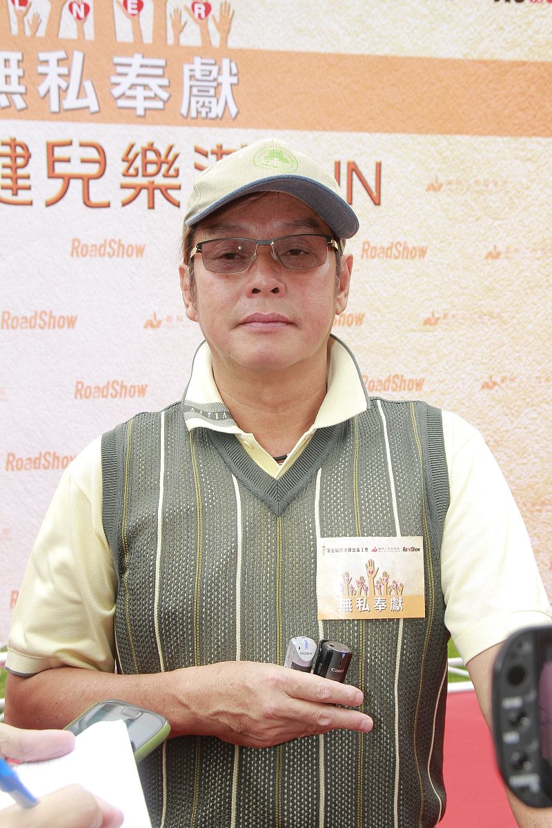 2013年9月28日,香港,谭咏麟出席义工活动.谭咏麟