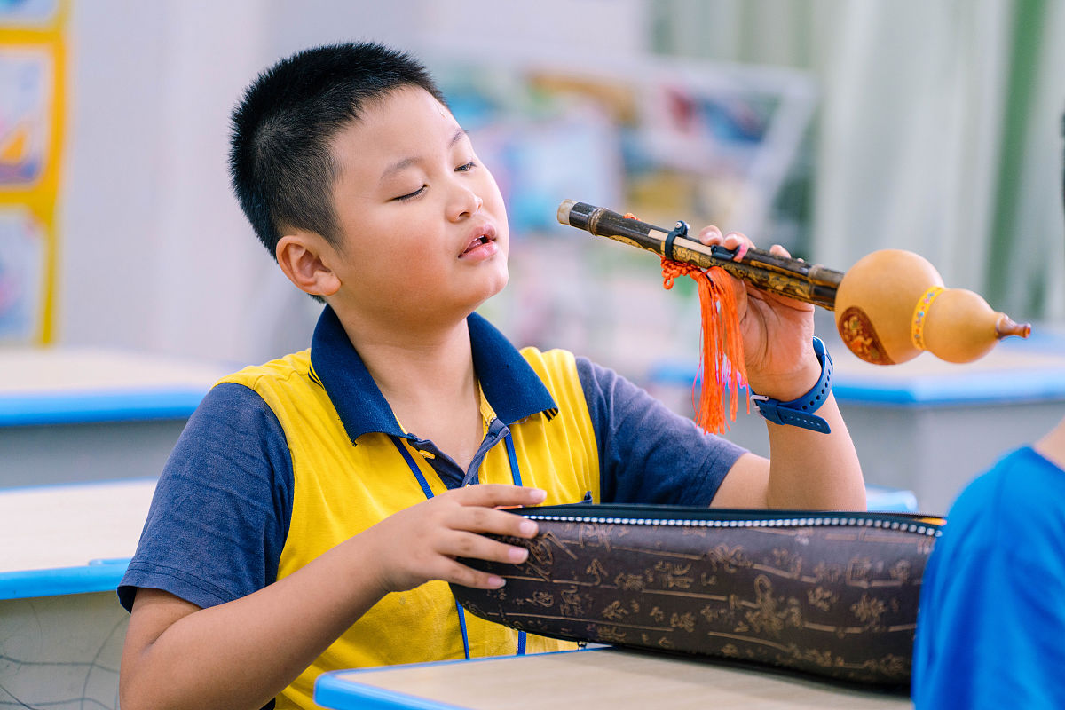 2021年7月19日,广东惠州暑期托管启动首日,在惠城区试点学校,学生参加