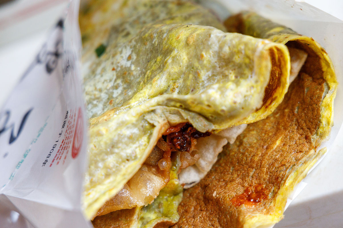 写一篇煎饼果子：北方特色早餐