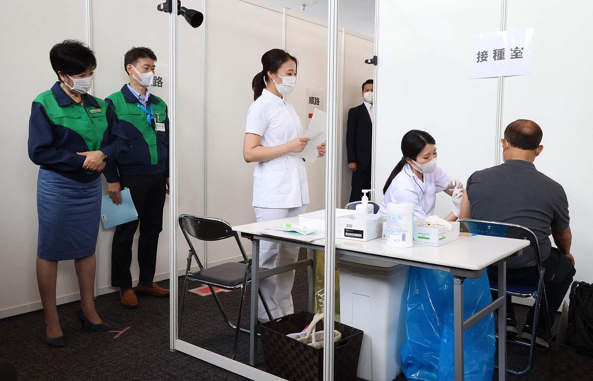 当地时间2021年6月18日,日本东京都开始为东京奥运会,残奥会工作人员