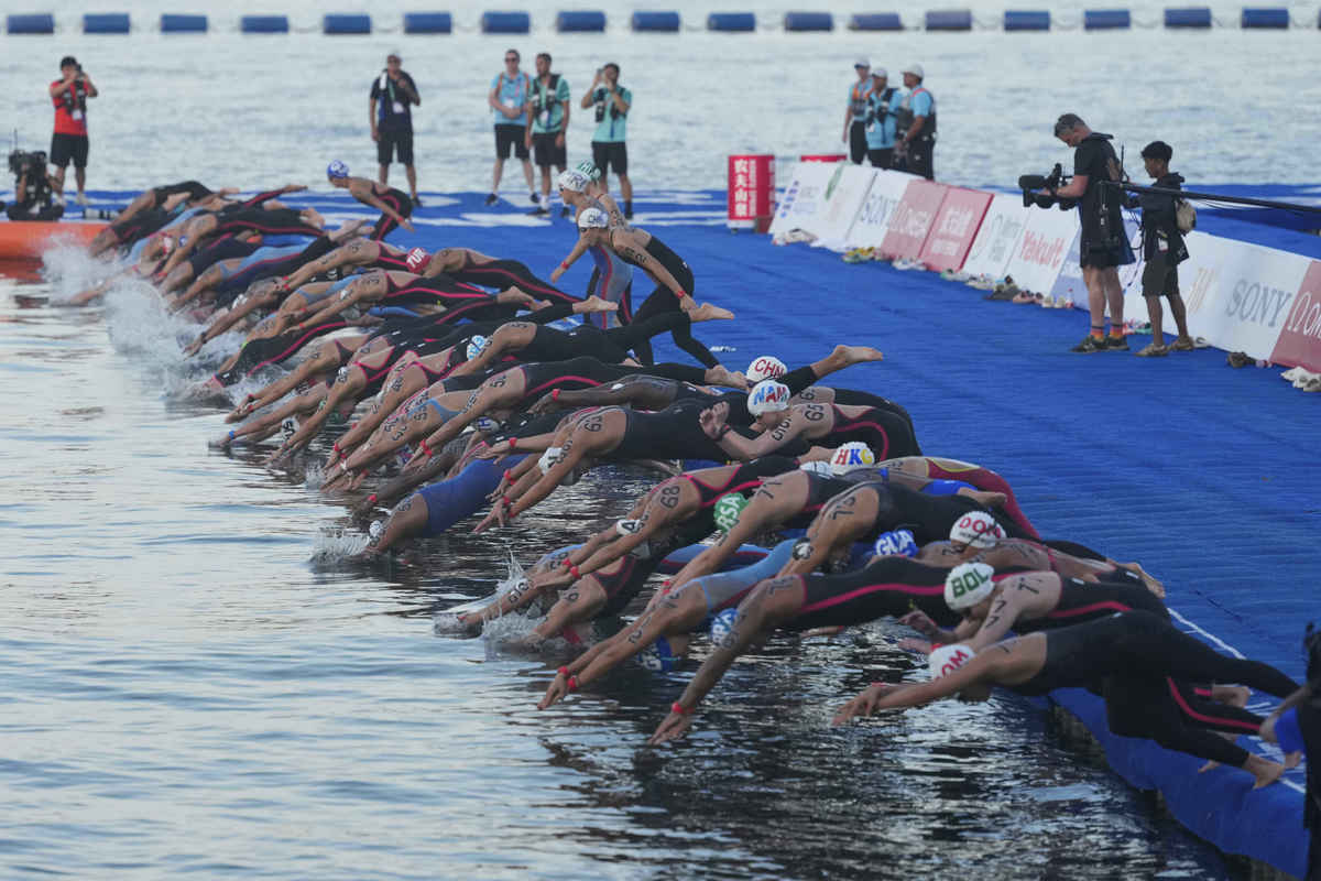 给这个稿子写10句用户跟评：今年横渡钱塘江定在7月29日！参赛名额增加到3000人报名后抽签