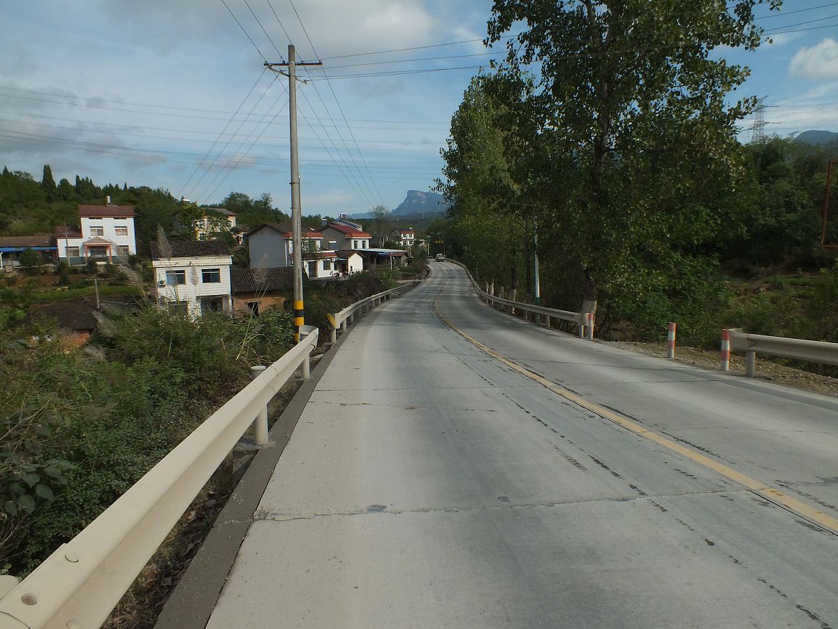 开公路政策处理的百分之九十以上指的是一个村还是一个乡