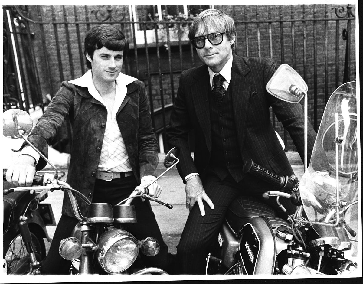american actor adam west (r), star of batman, with british actor