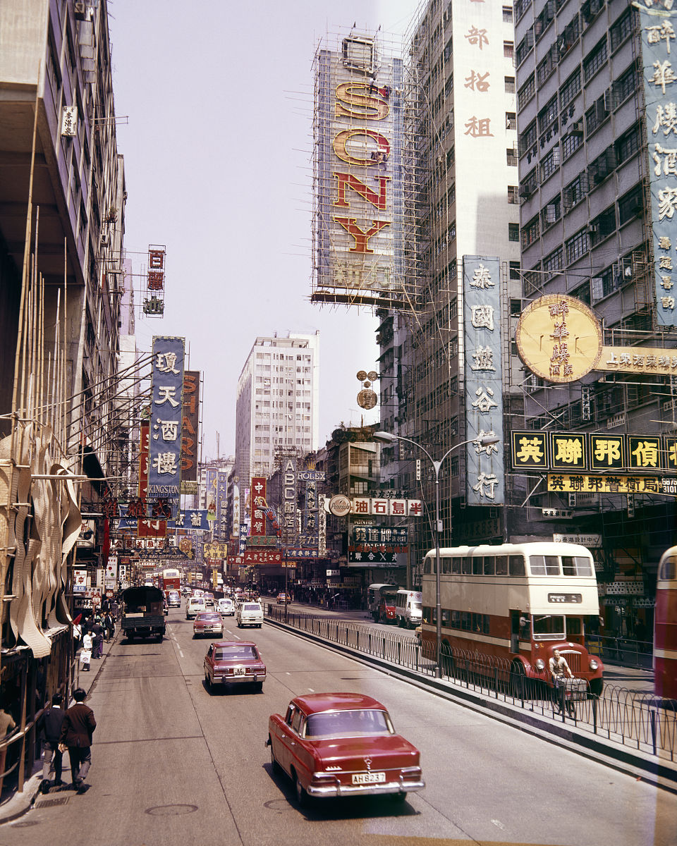 1970s cars traffic double decker buses on nathan road kowloon ci