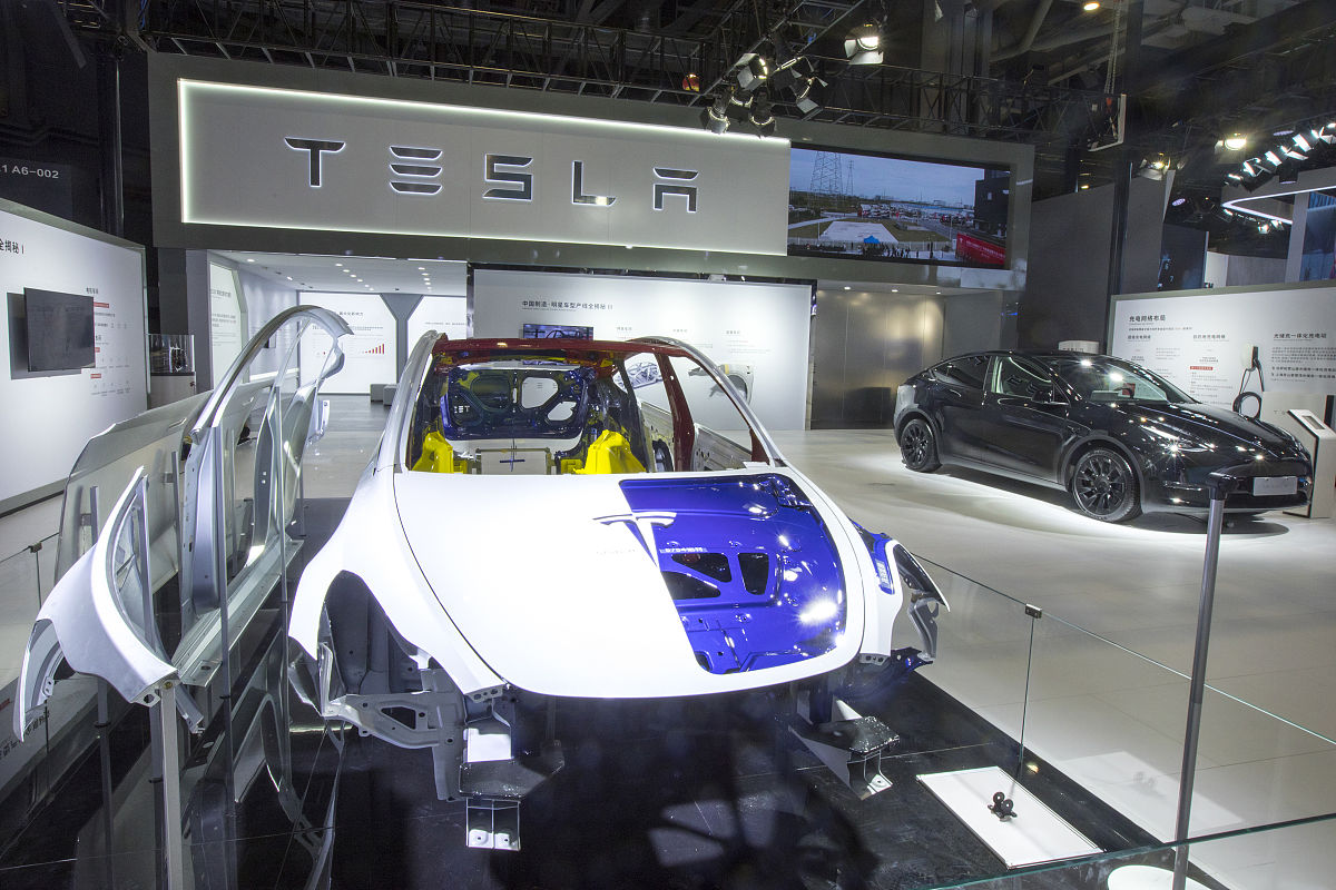 Expand the passage to 200 wordsTesla’s decision to build a factory in Shanghai was influenced by various factors including political economic social and technological factors