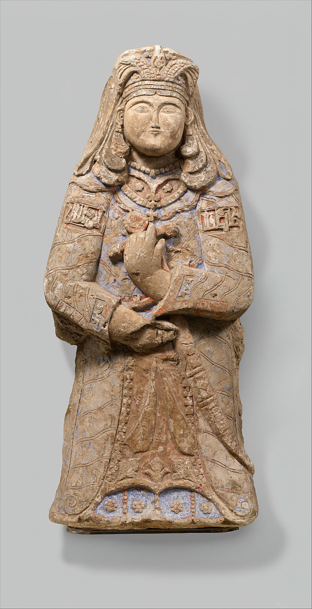 standing figure with feathered headdress, iran, 12th-early 13th 