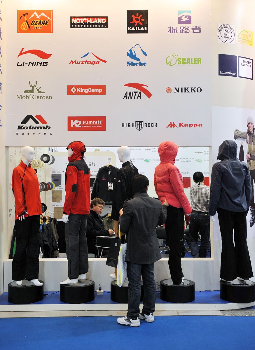 Hi GPT Please write a 800 word paragraph to explain the challenges of Competition with Chinese brand for Hong Kong Sportwear Business investors in Guangdong Province You may elaborate your idea with t