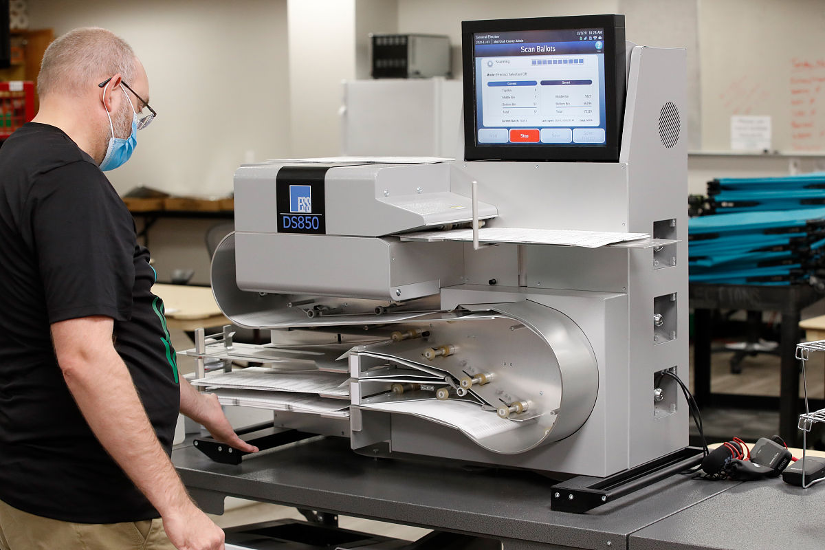 Online Detection of Laser Cladding Cracks using Acoustic Emission and Wavelet Denoising