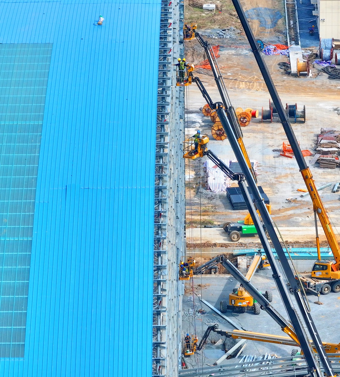 货物抓斗卸货洒落问题及防护措施