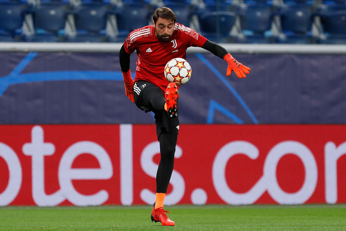 carlo pinsoglio of juventus in action during warm-up ahead of th