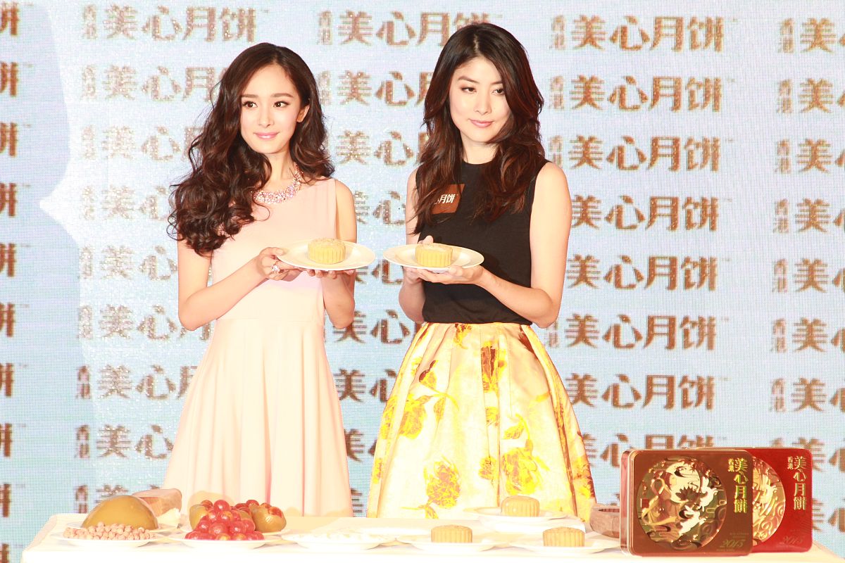 2013年07月31日,上海,明星参加月饼活动.杨幂,陈慧琳