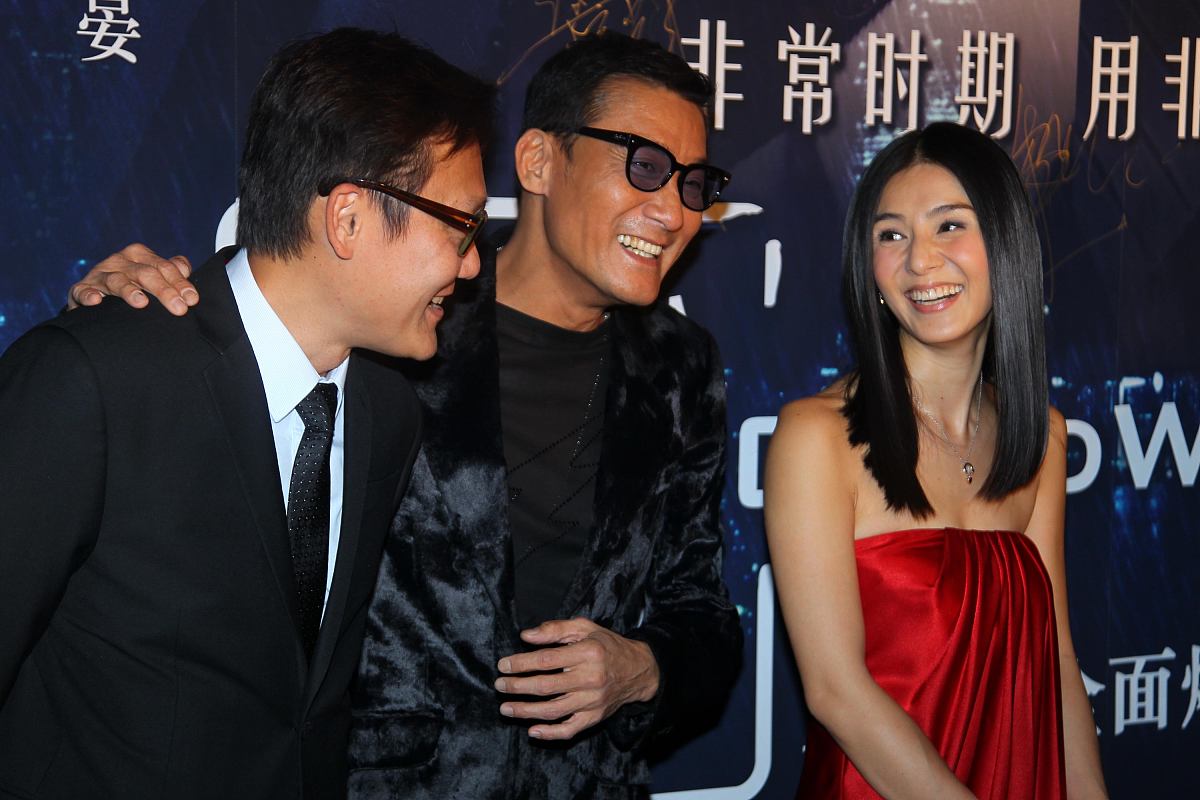 2012年11月05日,北京,电影《寒战》首映红毯举行.梁家辉,杨采妮+++_++