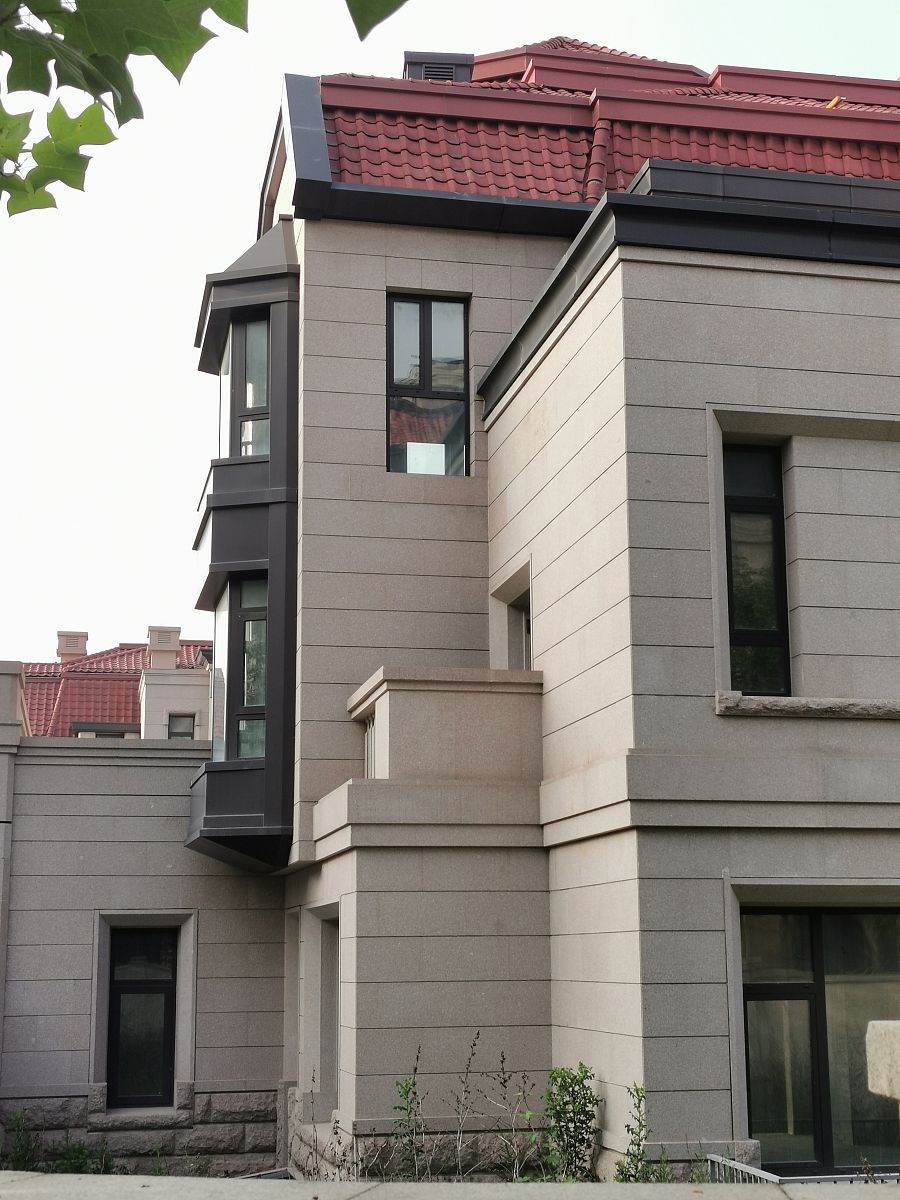 别墅外墙装修水包砂工艺：玻化微珠保温材料使用指南