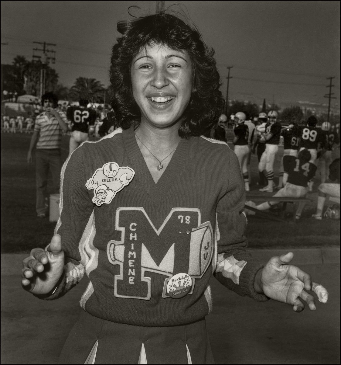 portrait of a laughing high school cheerleader, los angeles, cal