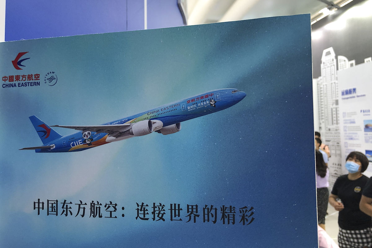 庆祝中国民航成立65周年：回顾发展历程，展望美好未来