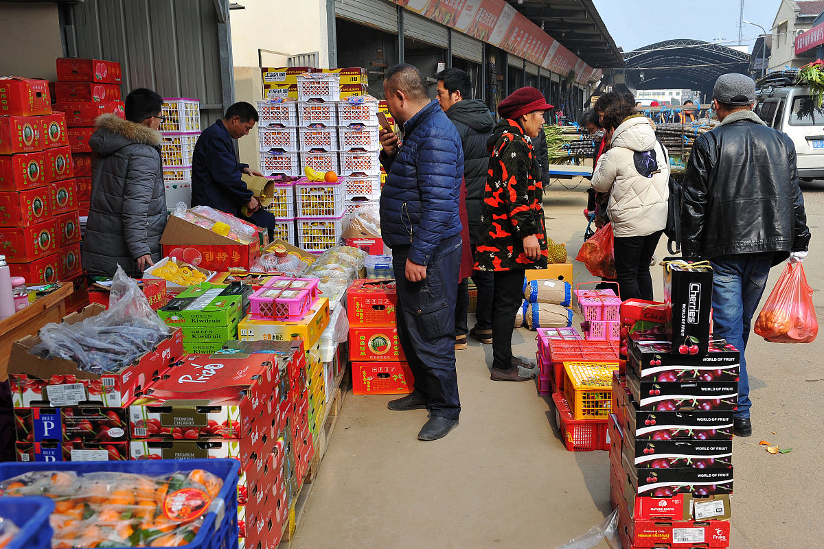 2019年01月22日,浙江金华,春节临近,金华市农产品批发市场一派繁忙的