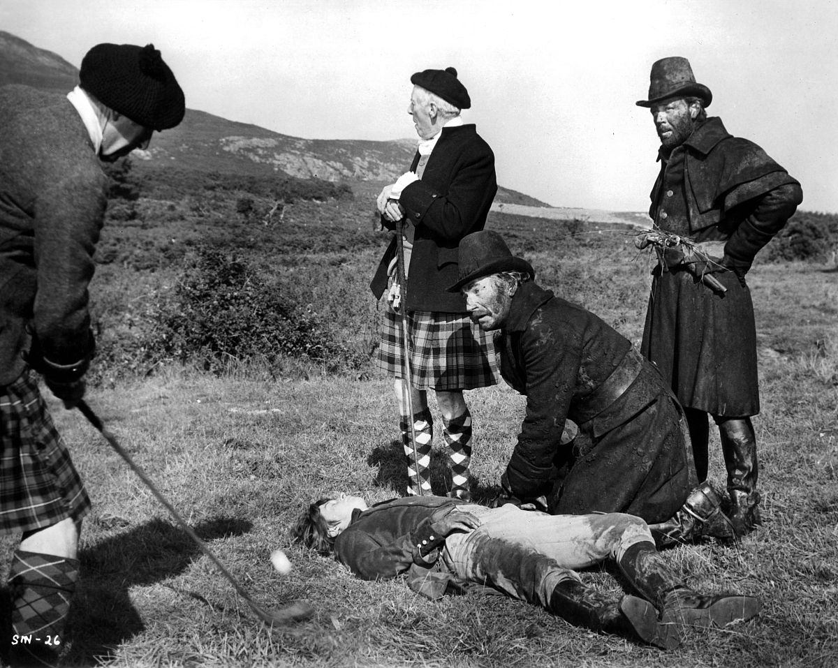 circa 1969: actors john hurt and nigel davenport on set the movi