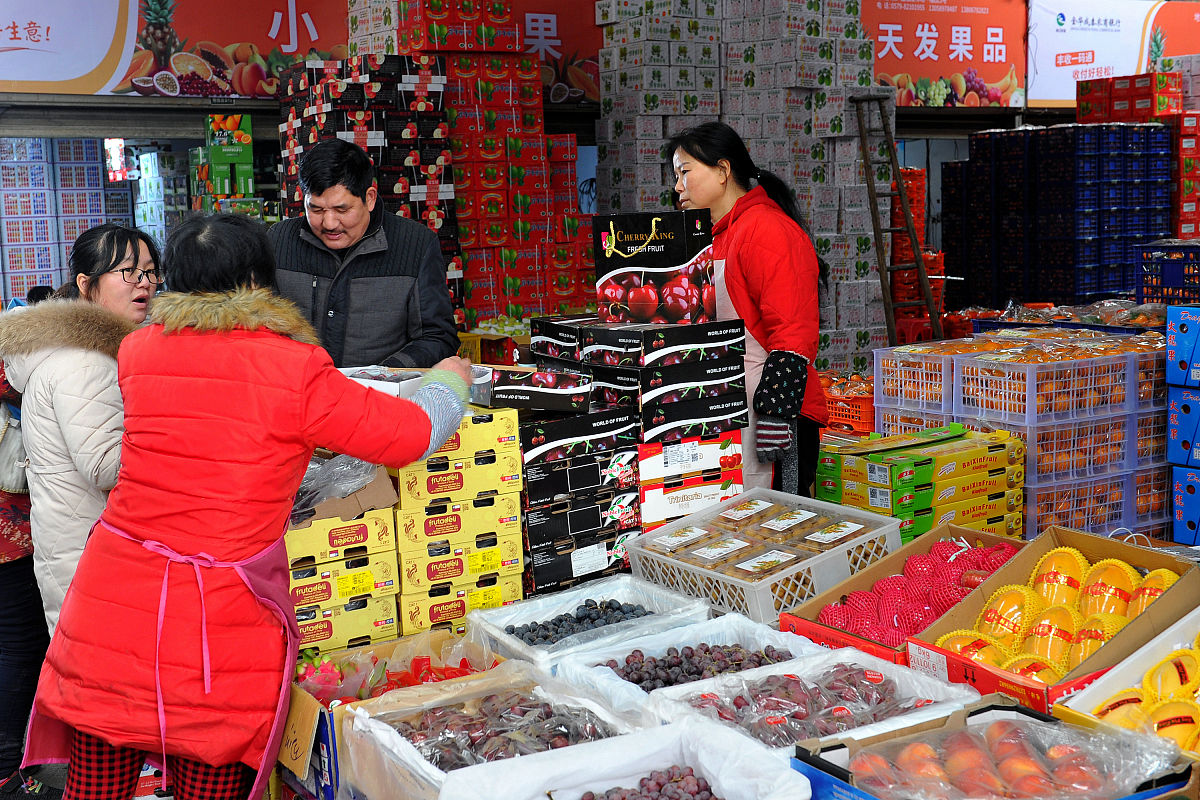 2019年01月22日,浙江金华,春节临近,金华市农产品批发市场一派繁忙的