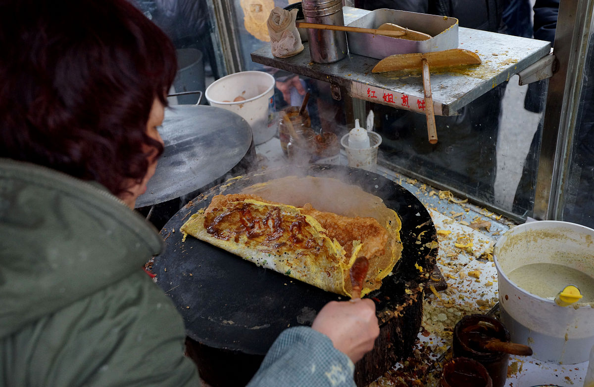 写一段描述天津美食的文字500字左右