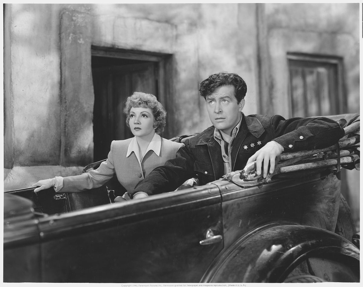 claudette colbert and ray milland star in a scene from arise, my