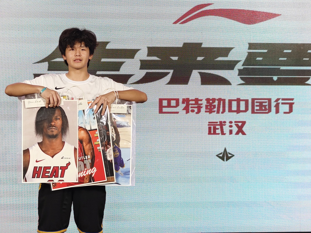 请对回归体育精神加大李宁品牌的建设力度 这一小节进行写作