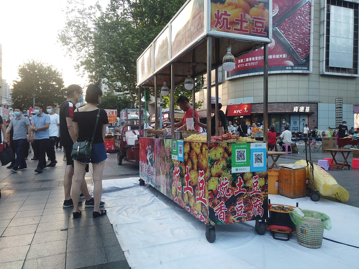 城市地摊经济与摊贩管理:文献综述 城市地摊经济与摊贩管理:文献综述