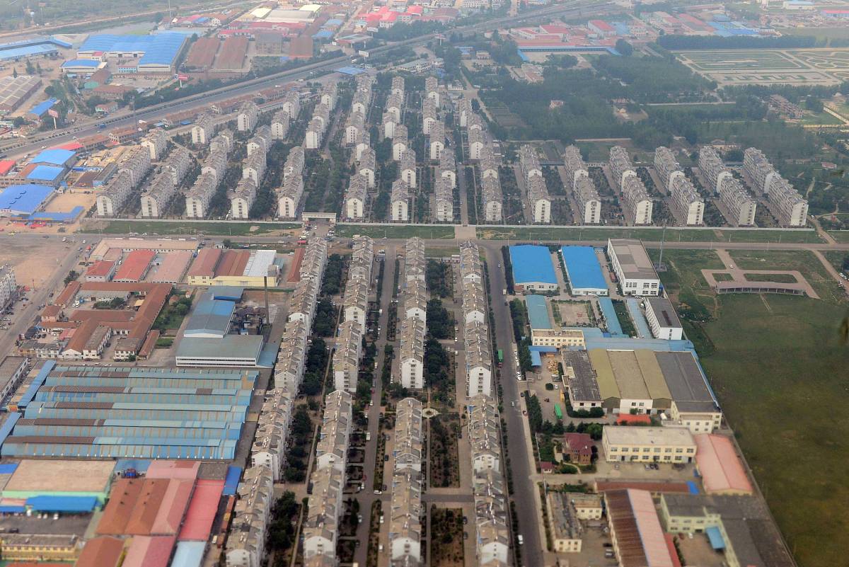 青岛市李沧区侯家庄社区为什么是2008年有集体土地转国有土地的回答加拓展。