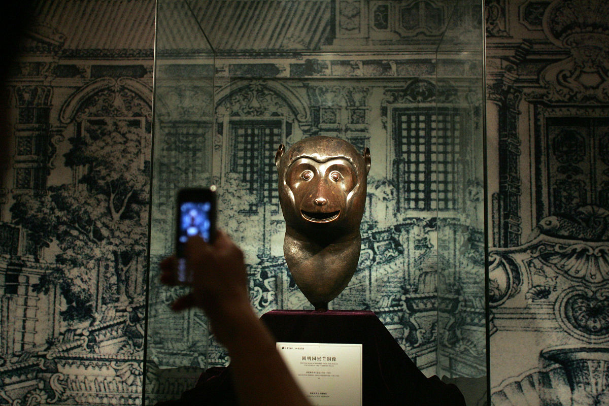 (武汉同城媒体请勿下载)2011年6月18日,圆明园兽首及南北朝佛像展在武