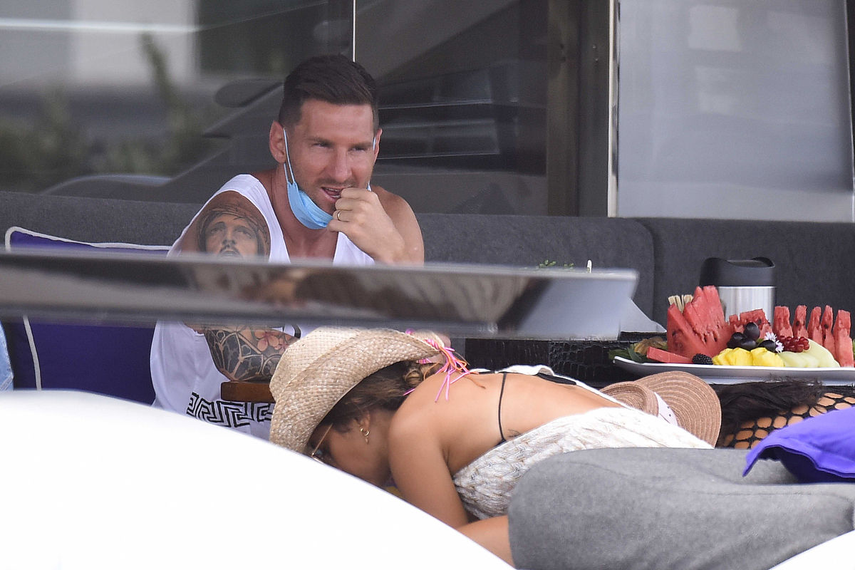 <strong>i</strong>biza, spain - august 02: leo messi with his wife antonella ro