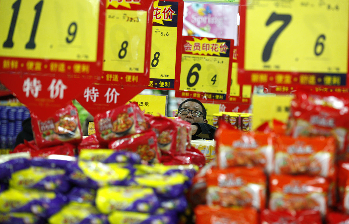 5折是乘以05还是005