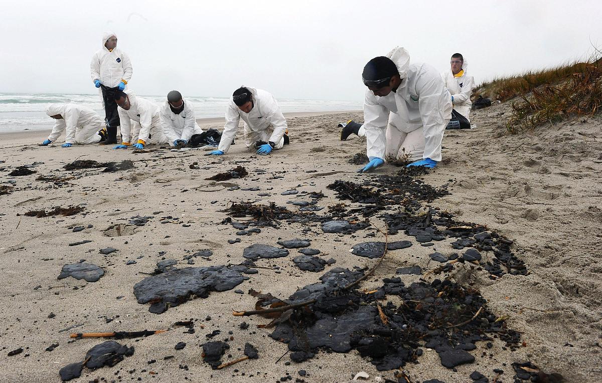 When the consignee was preparing to pick up the container they found water flowing out from the bottom corners of the container The consignee was concerned that this may be due to the melting of