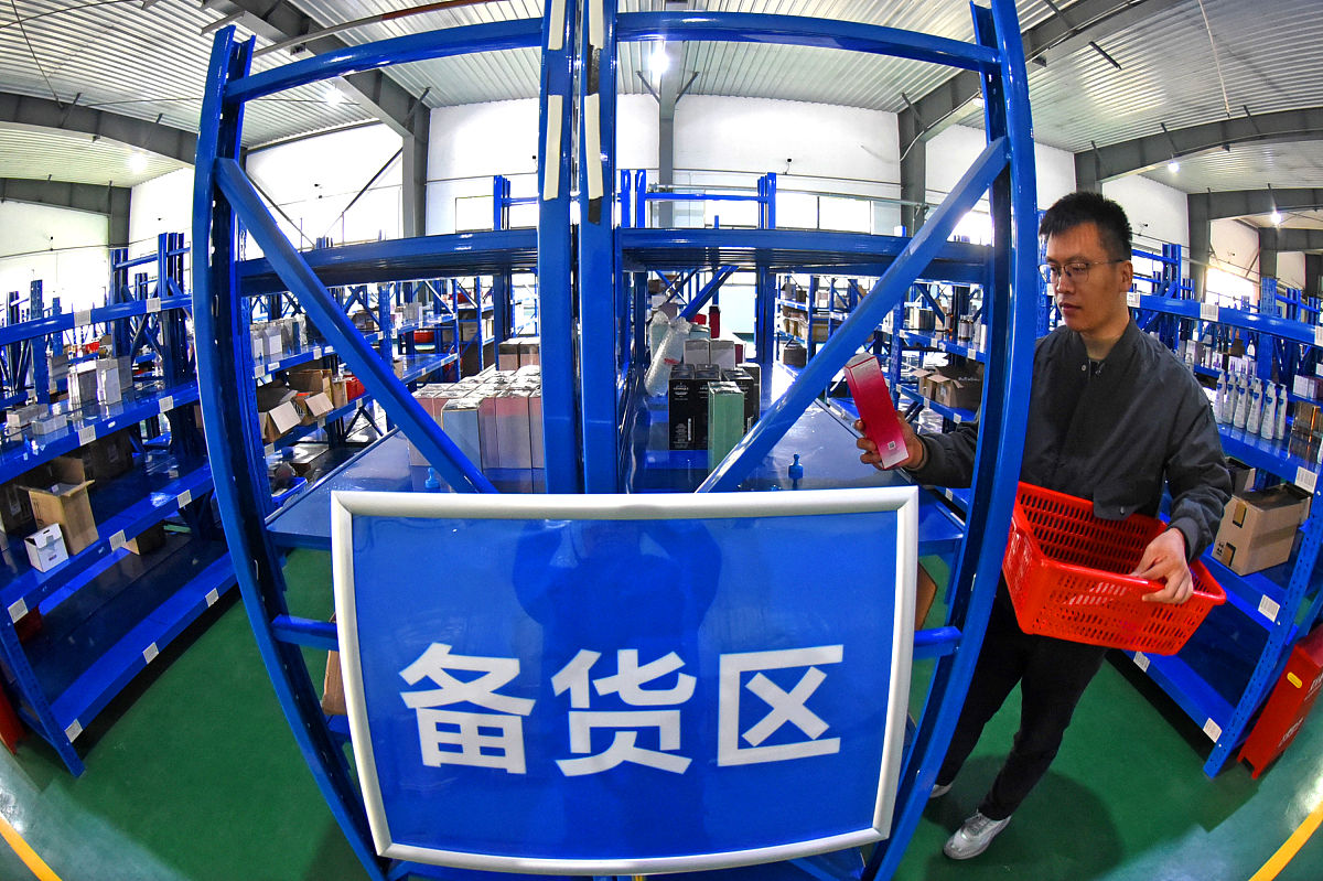 UML仓库管理系统类图：业务管理员和仓库管理员角色