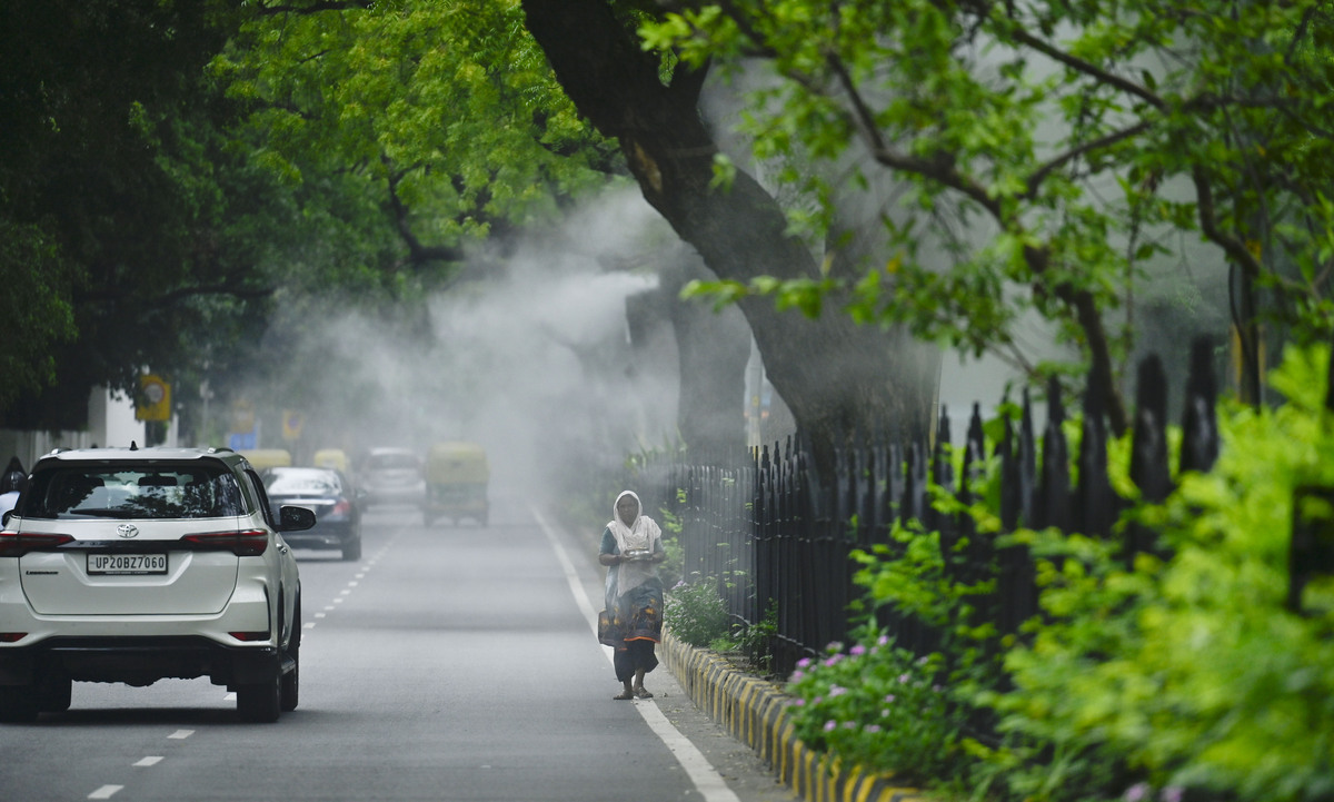 热天往地上洒水回降温吗