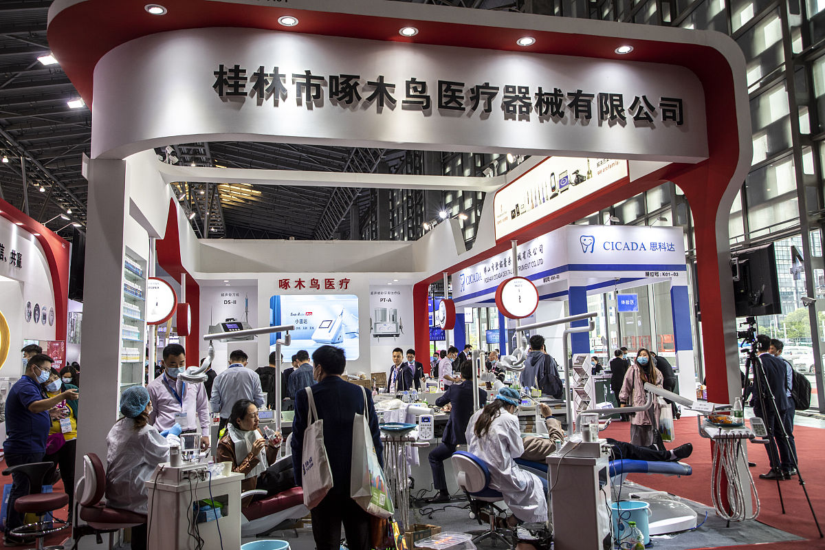 桂林市啄木鸟医疗器械有限公司讲座总结报告 - 齿科领域领先技术与产品