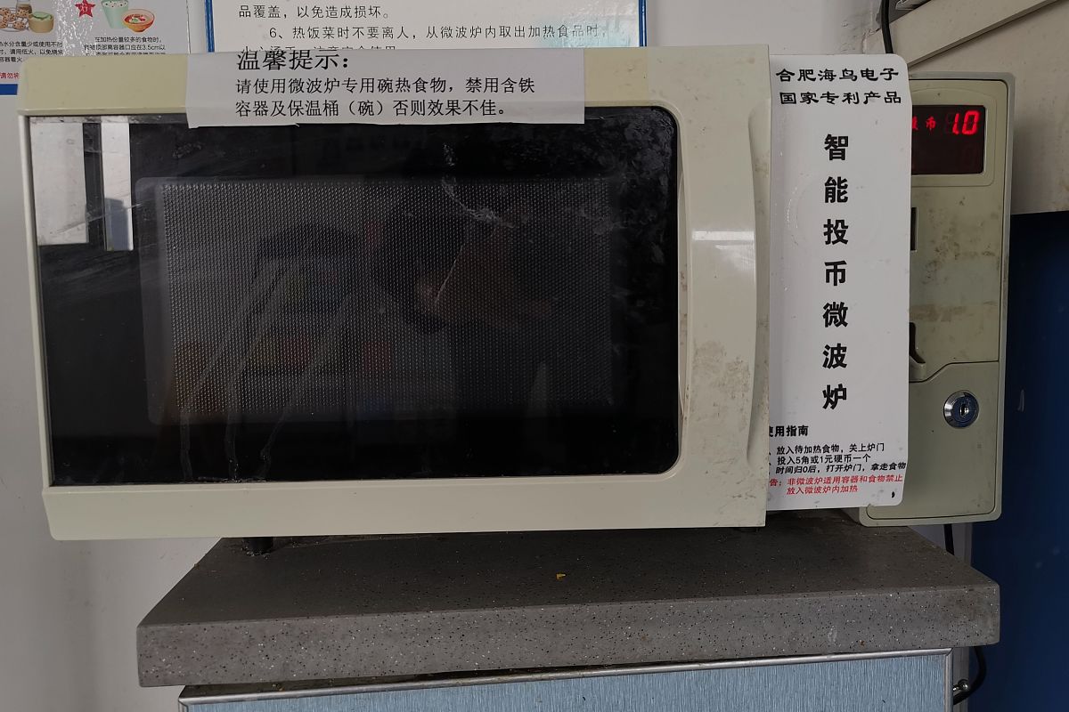 为什么微波炉标的频率是50HZ