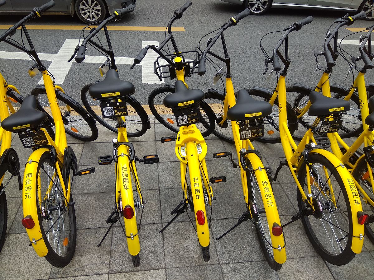 ofo小黄车兴衰史：从共享单车巨头到破产重组