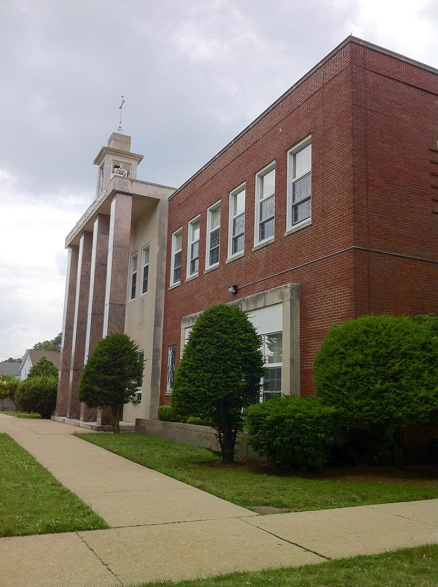 main entrance of elementary catholic school. (photo by: educatio