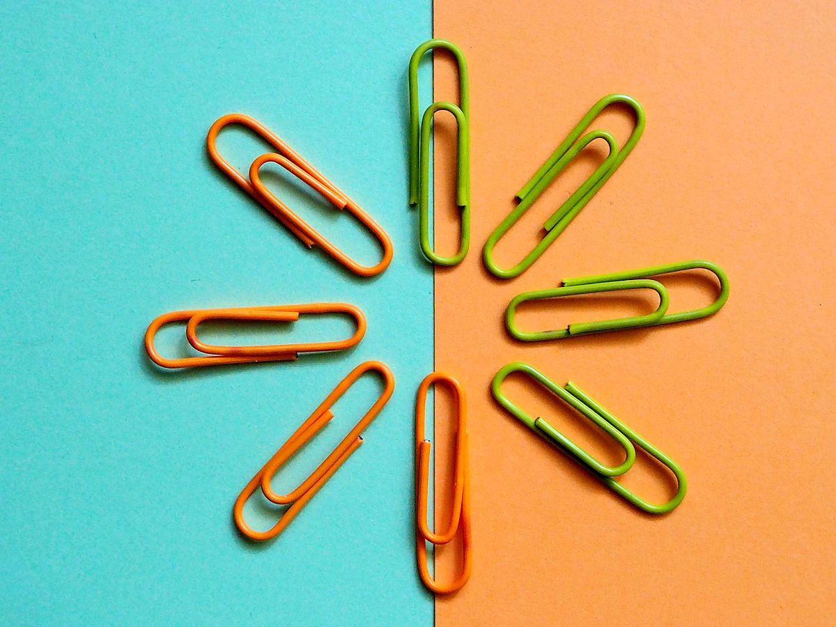 图中两种回形针的长相等吗?为什么?