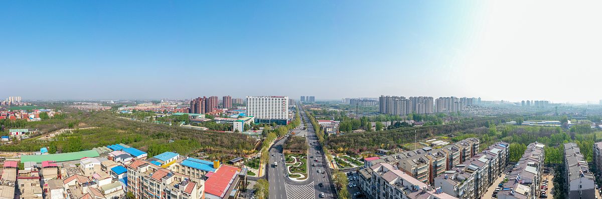 2021年4月10日,河南郑州郑新路,航拍新郑郑韩故城遗址公园及附近城墙.