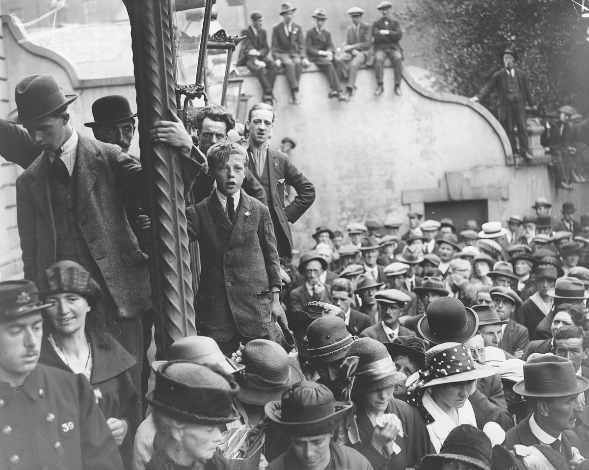 a boy sings a nationalist song amidst a crowd gathered in dublin